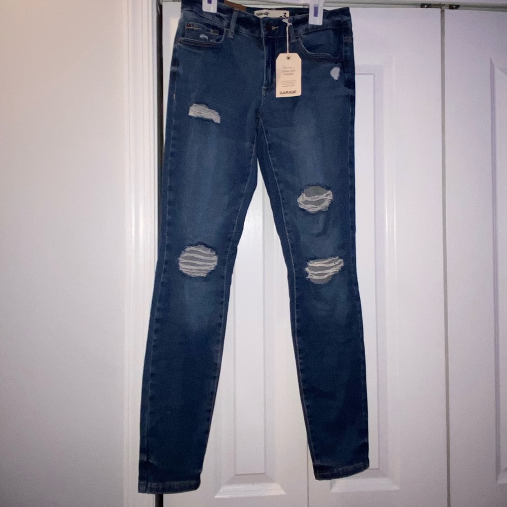 Size 03 never worn ripped garage jeans